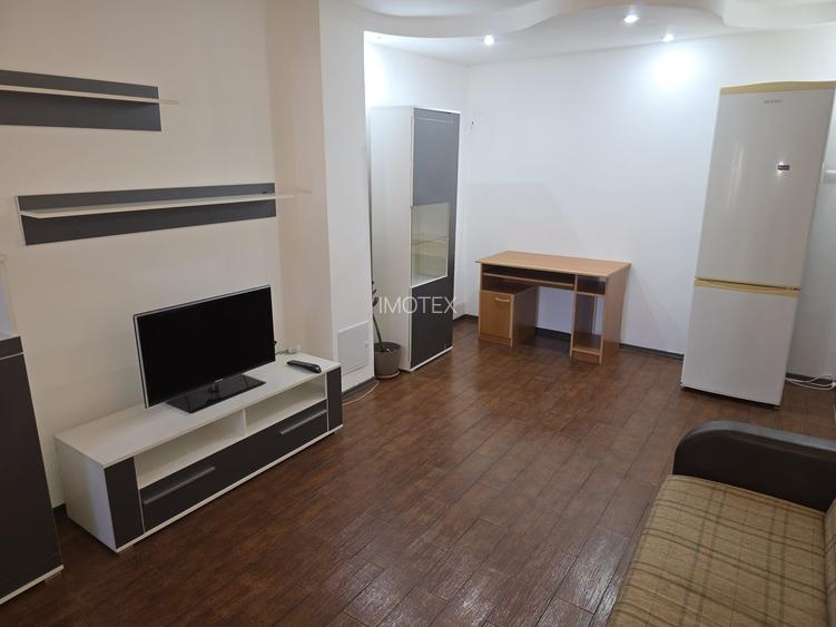 Garsoniera moderna transformata in doua camere in Gavana / Lumina - 6