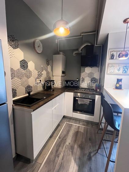 Oază de liniște la Unirii: Apartament modern în bloc nou, costuri minime - 3