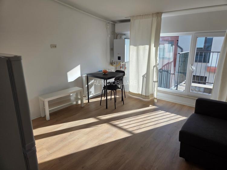 Garsoniera utilata,mobilata ,totul nou ,prima inchiriere ,str Oituz nr 71 - 9