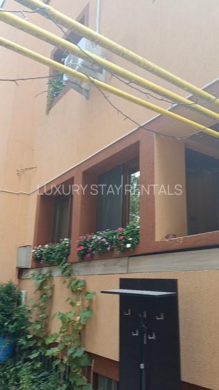 propun spre vinzare apartament in vila conpusa din P+1E=M - 5