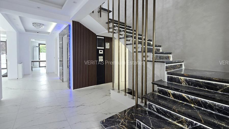 Casa superba teren 1000 mp, lift, 2 dormitoare parter, spatii ample, intimitate - 17