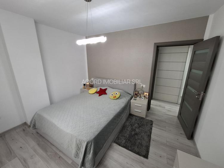 Apartament cu trei camere și loc de parcare în bloc nou din cartierul Km4 - 8