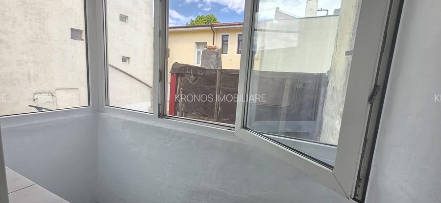 OCAZIE ! CENTRU PIATA UNIRII 2 CAMERE 2 BALCOANE + BOXA ETAJ 1 PRET 78.500 EURO - 16