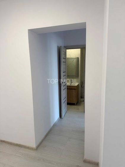 Dacia - la bulevard 2 camere decomandat, etaj intermediar, liber - 7