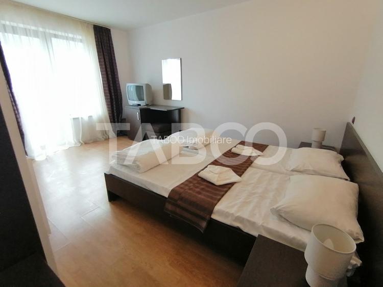 Pensiune 13 camere 16 bai sauna piscina si teren 1565 mp Cisnadioara - 27