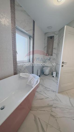 Proprietate premium în Filiași, locuință de lux cu spații comerciale - 26