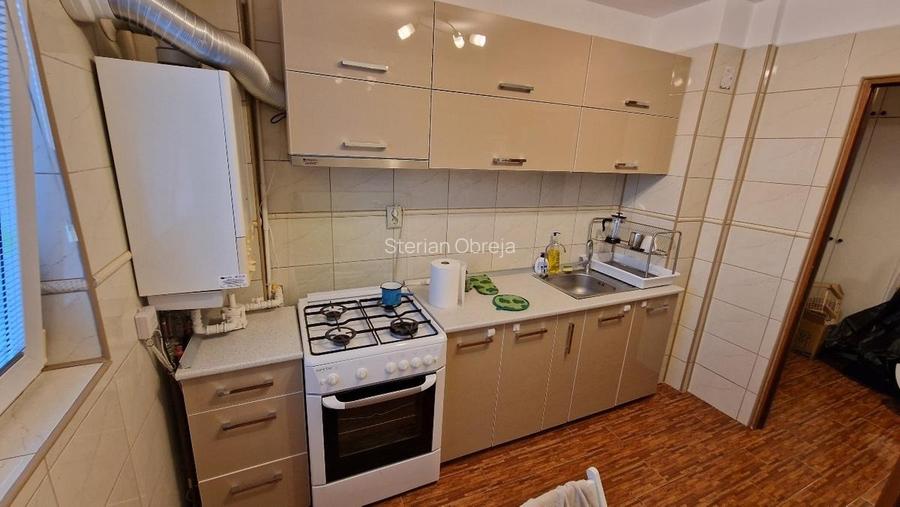 Vand apartament 2 camere, complet mobilat, centrala proprie, loc parcare de - 10