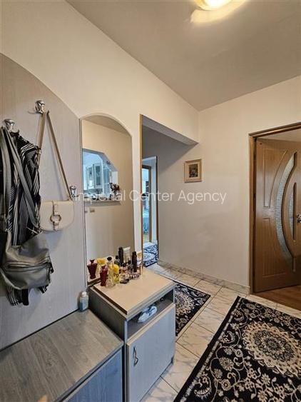 APARTAMENT DE VANZARE CU 3 CAMERE IN ONESTI BLOC NOU,ZONA DE JOS - 9