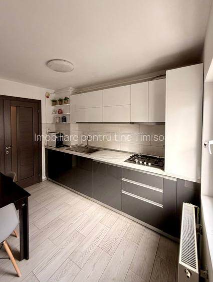 Apartament 3 camere zona Kiriac la etajul 2 doua bai amenajat mobilat centrala - 2