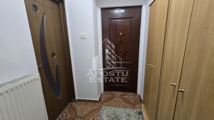 Apartament de vanzare cu 2 camere, centrala proprie, parter inalt, zona Ronat