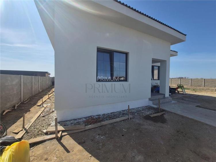 Casa individuala - parter - 3 dormitoare - finalizata - teren foarte mare - 4