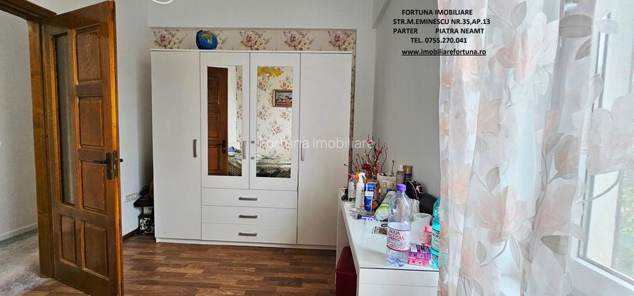 Locuinta individuala(apartament 4 camere)+spatiu comercial si teren ,Darmanesti - 12