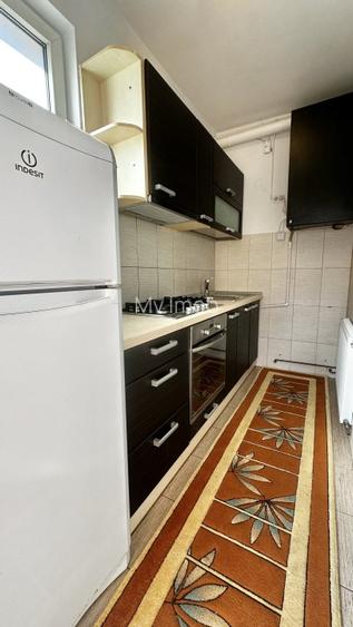 Apartament in casa cu 2 camere ,beci si curte pe Strada Titulescu ,zona Afi - 9