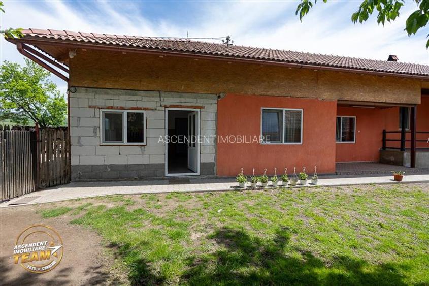 FILM! Pe 1.200mp teren+rezidenta cu gradina inflorata,aproape de Targu Secuiesc: - 56