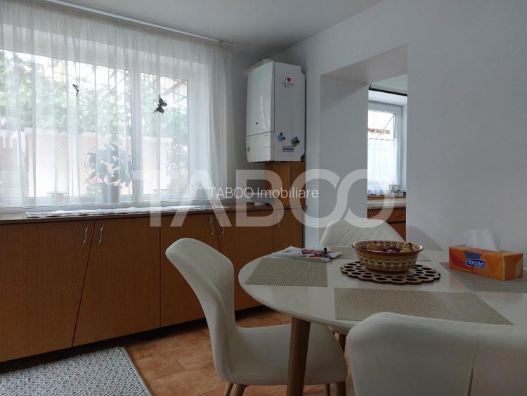 Casa 109 mp 4 camere pivnita terasa loc parcare curte comuna Cisnadie - 13