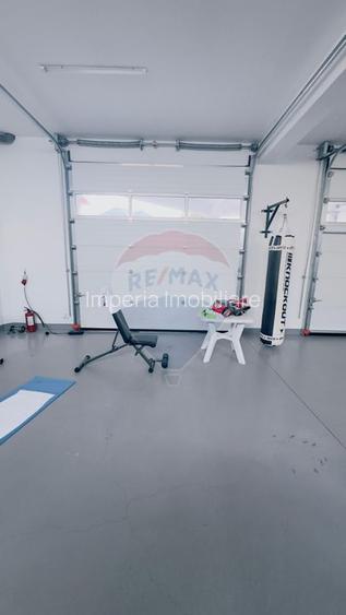 Proprietate premium în Filiași, locuință de lux cu spații comerciale - 56