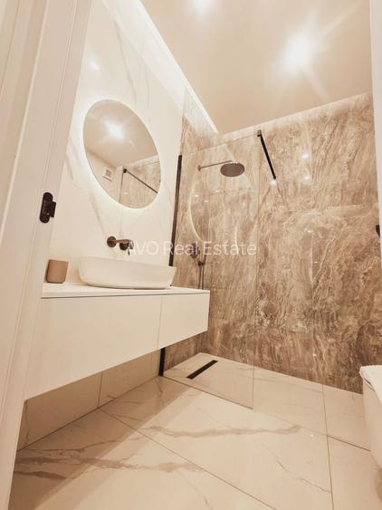 Apartament 2 camere de vânzare - Eleganță și confort în Exigent Plaza - 11