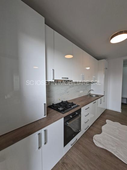 Bloc nou,  apartament   cu  parcare si curte proprie. - 4