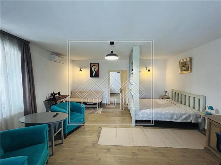 Casa cu 6 apartamente + gradina - pretabil investitii