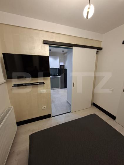 Garsoniera moderna, , zona Astra, renovata complet, centrala si aer conditionat