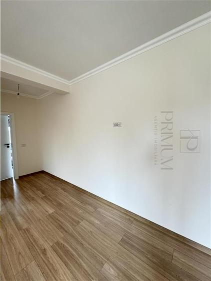 BRAYTIM - 2 CAMERE - ETAJUL 1 - RULOURI ELECTRICE - PARCARE INCLUSA - FINISAJE D