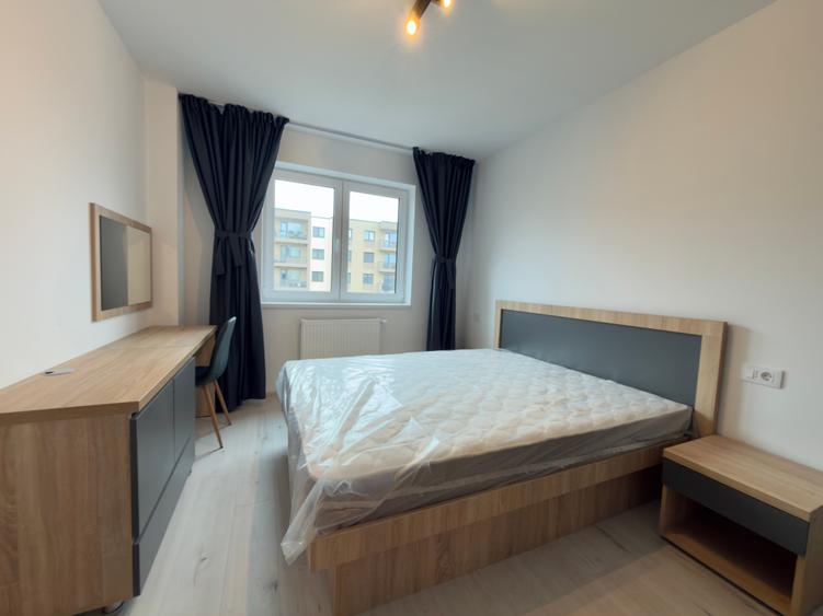 Apartament cu 2 camere de vanzare in zona Tractorul mobilat ,nou in garantie