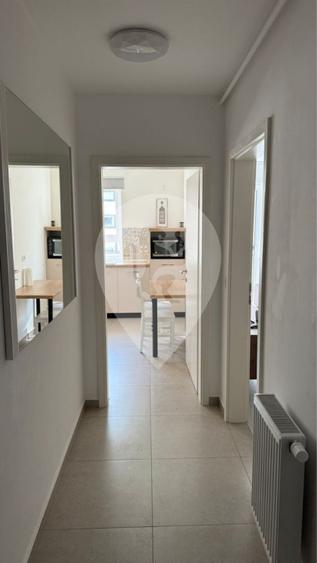 Garsoniera spatioasa 45 mp + balcon + loc parcare inclus