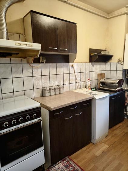 Apartament 2 camere bloc caramida etaj 1 - 2