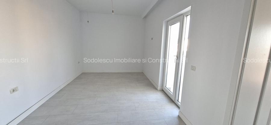 Duplex spatios cu garaj si pereti dublii - 17