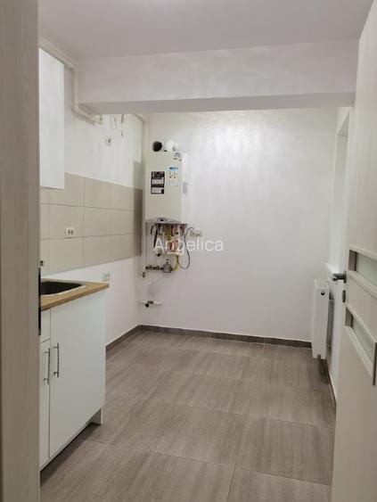 Garsoniera 35mp cu curte 23mp, loc parcare inclus in fata portii - 6