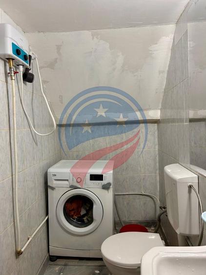 Apartament la casă, 2 camere + curte proprie, 85 mp – Str. C.D. Fortunescu