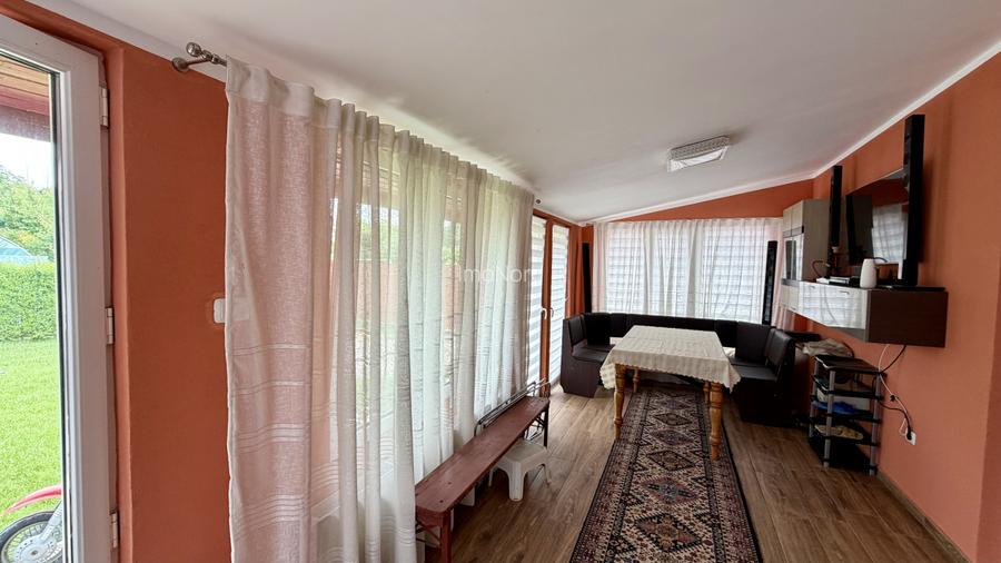 Tunari casă în Dimieni – 3 camere, curte amenajată, grădină cu seră, parcare - 11
