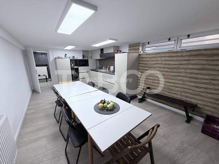 Cladire de birouri cu spatiu comercial la parter si 6 locuri parcare - 12