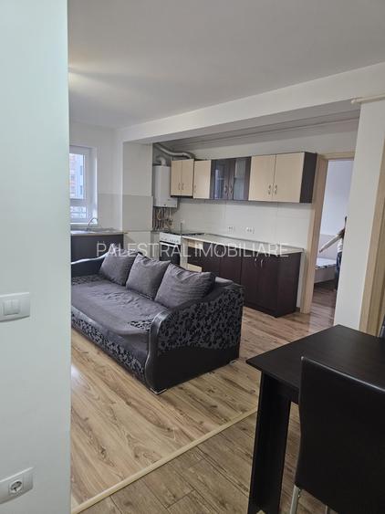 Apartamemt tip studio mobilat,parcare,Tractorul-Coresi,126500 Euro - 2