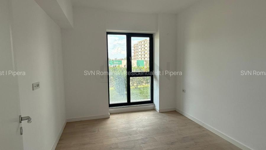 REA1025003 Apartament cu gradina in First Estates Pipera - 12