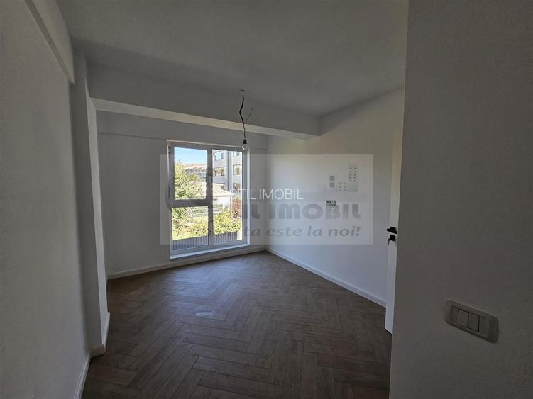 Apartament exclusivist dispus P+1E + curte 70mp - 10
