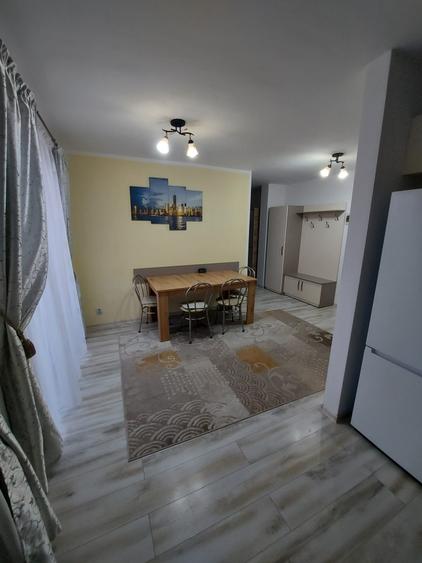 Apartament cu 3 camere,etaj intermediar,parcare subterana,zona Eroilor
