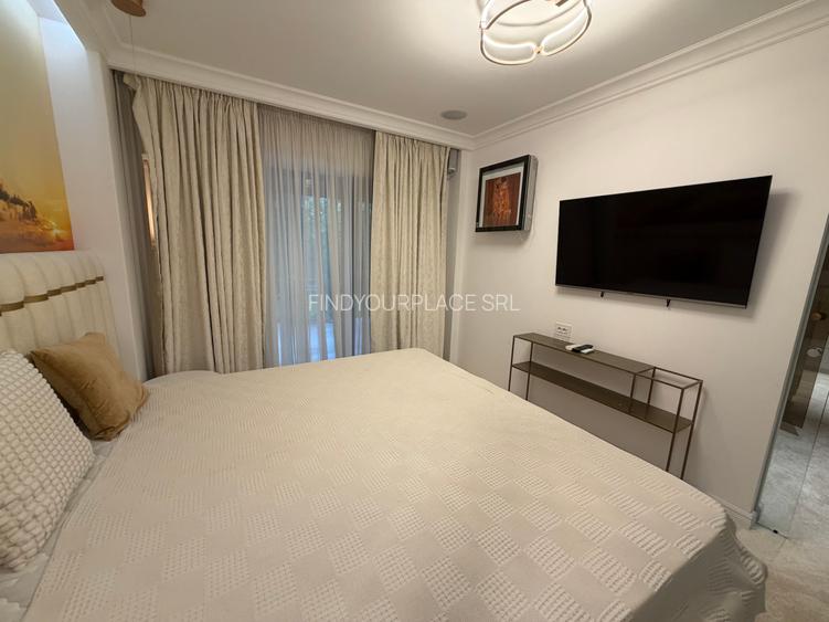 Apartament în Arcadia Domenii,230mp curte,3 parcări incluse