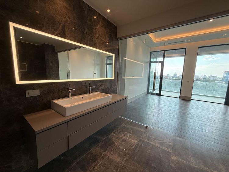 Penthouse Exclusivist cu Terase Generoase și Finisaje Premium în Inima Capitalei