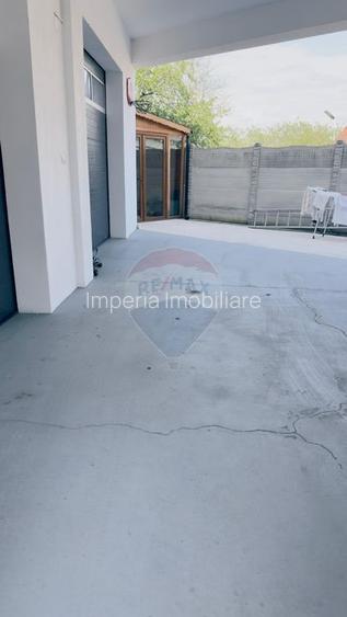 Proprietate premium în Filiași, locuință de lux cu spații comerciale - 52