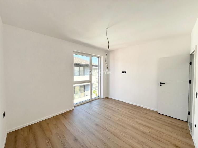 Ap pe 2 niveluri. 4 camere, 2 bai. 2 locuri de parcare. - 11