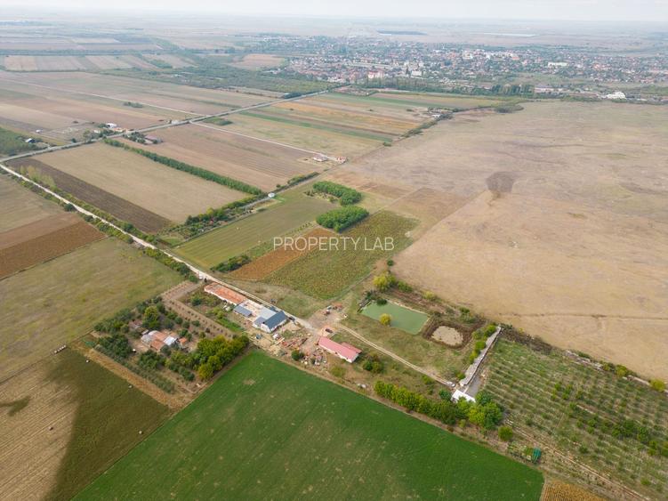 Casă cu teren 13 418 mp intravilan