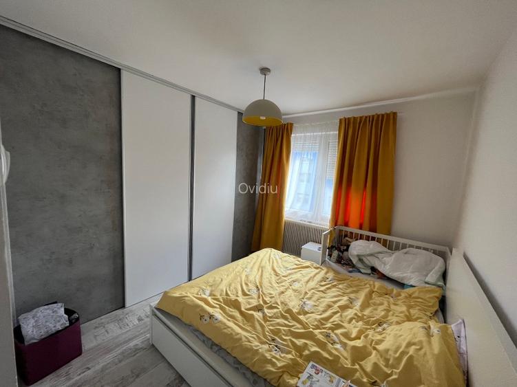 Apartament cu 3 camere, 2 băi, 66 mp + 4 mp balcon, decomandat, etaj 2/4 - 12