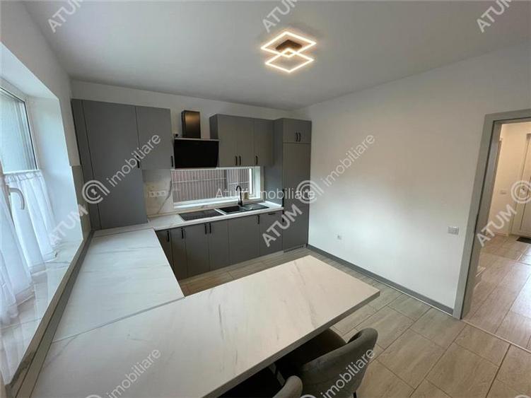 Casa cu 4 camere decomandate si curte libera 180 mp in Selimbar - 10
