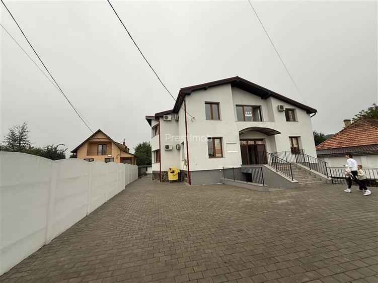 De inchiriat spatiu birouri, 10 birouri , 4 bai, garaj, 4 bai si teren 10 arii,S - 21