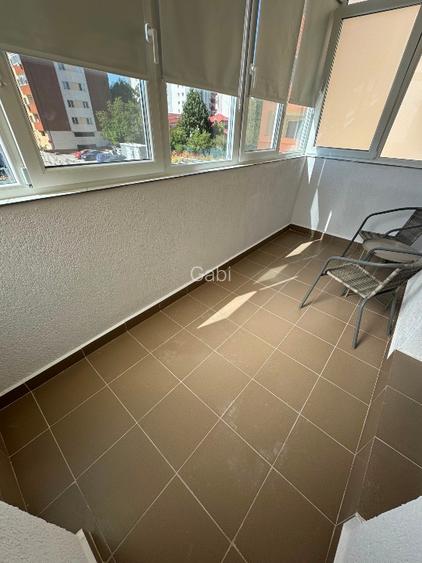 Proprietar închiriez ap 3 camere, decomandat, NOU, 2 băi, parcare subterană  - 13