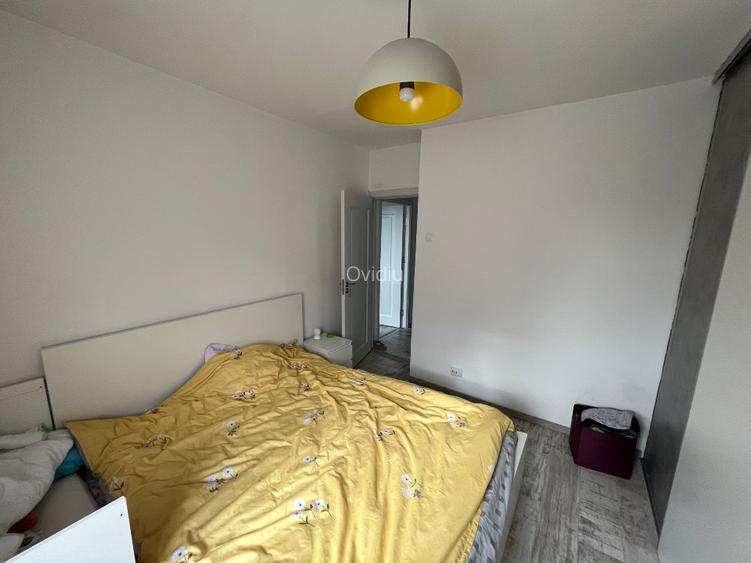 Apartament cu 3 camere, 2 băi, 66 mp + 4 mp balcon, decomandat, etaj 2/4 - 9