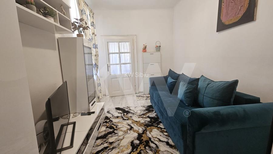2 camere în inima orașului – ideal pentru locuit sau investiție - 3