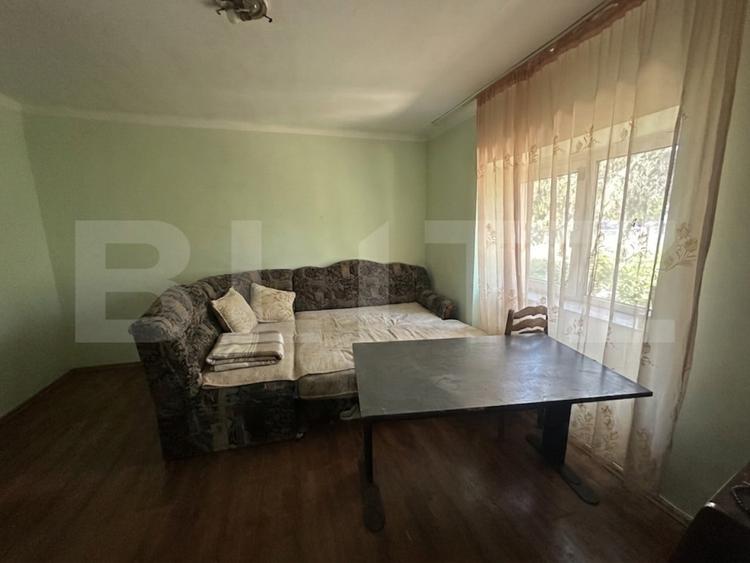 Casa plan parter 74 mp utili , 1500 mp teren,zona Lucian Blaga