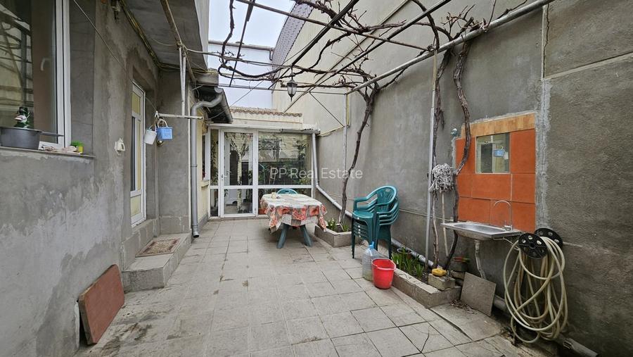 Piata Amzacea - casa 3 camere (suprafata totala teren 114 mp ) - 12